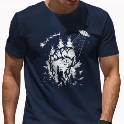 25 Best Bigfoot Christmas Shirts to Make Your Holidays Legendary 24 Bigfoot UFO Santa Abduction Christmas Shirt Funny Sasquatch Paw Print Tee