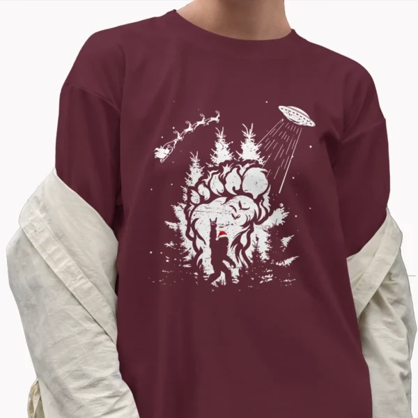 Bigfoot UFO Santa Abduction Christmas Shirt Funny Sasquatch Paw Print Tee