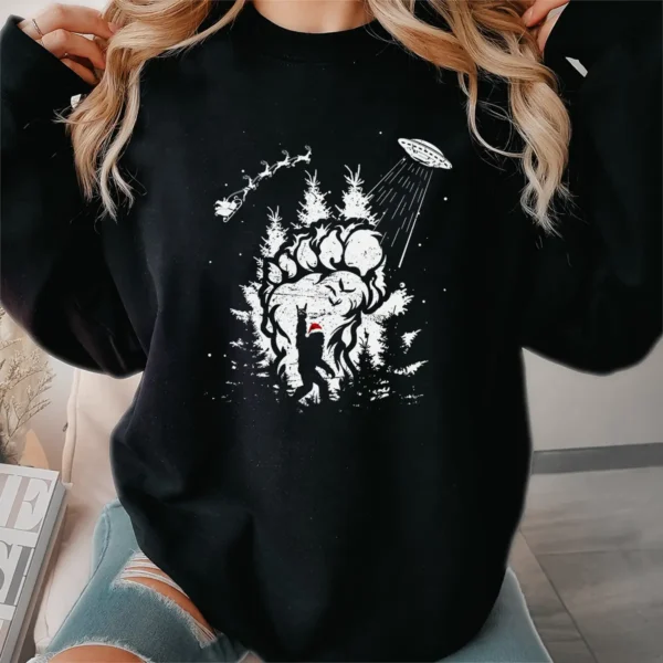 Bigfoot UFO Santa Abduction Christmas Shirt Funny Sasquatch Paw Print Tee