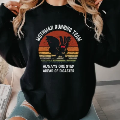 10 Best Mothman Shirts That Every Believer Needs to Own 5 Funny Mothman Running Team Shirt Ahead of Disaster Cryptid Tee