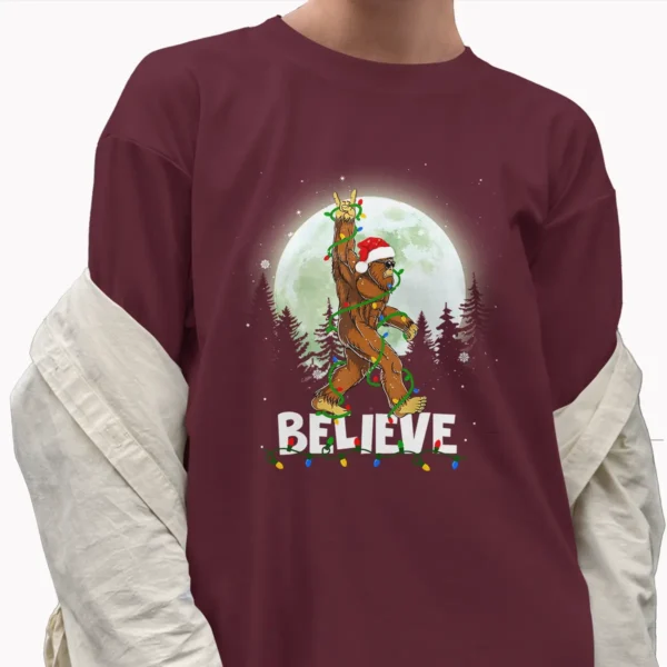 Rock and Roll Santa Bigfoot Christmas Shirt Funny Believe Sasquatch Tee
