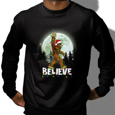 25 Best Bigfoot Christmas Shirts to Make Your Holidays Legendary 4 Rock and Roll Santa Bigfoot Christmas Shirt Funny Believe Sasquatch Tee