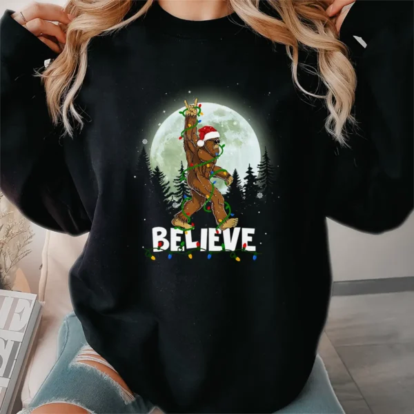 Rock and Roll Santa Bigfoot Christmas Shirt Funny Believe Sasquatch Tee