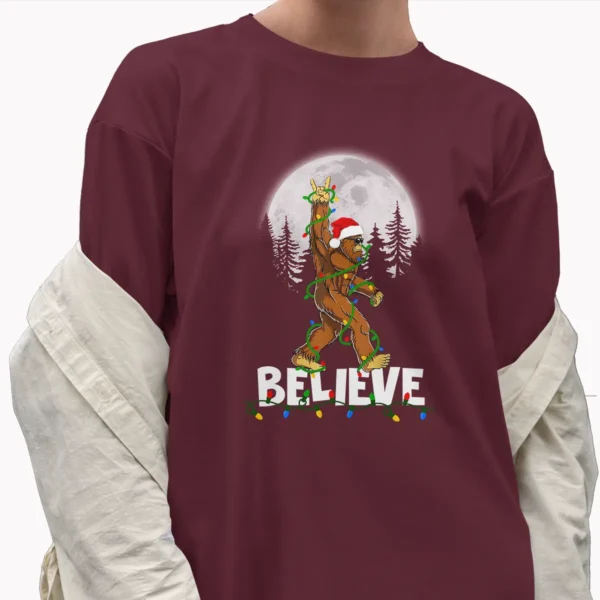 Rock On Bigfoot Believe Christmas T-Shirt Funny Santa Sasquatch Tee