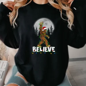 Rock On Bigfoot Believe Christmas T-Shirt Funny Santa Sasquatch Tee