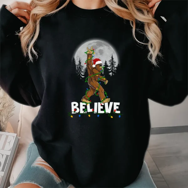 Rock On Bigfoot Believe Christmas T-Shirt Funny Santa Sasquatch Tee
