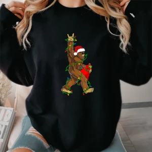 Rockin' Santa Bigfoot Christmas Shirt Funny Sasquatch with Gift Sack