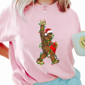 Rockin' Santa Bigfoot Christmas Shirt Funny Sasquatch with Gift Sack