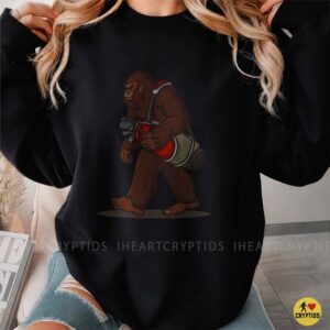 Bigfoot Carrying Golf Bag Funny Cryptid Golfer Gift Shirt
